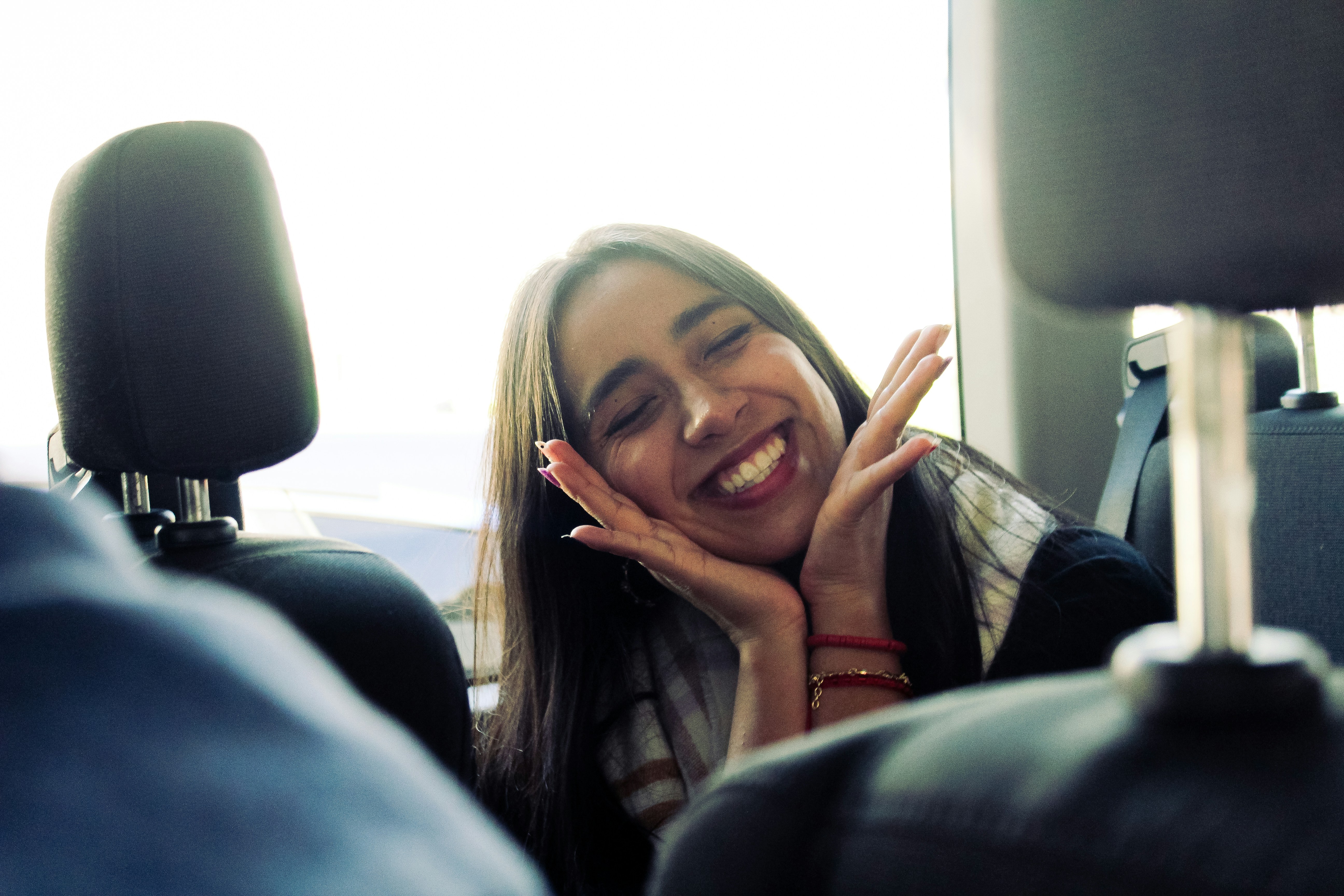 Happy passengers being transported by Flighter's seamless shuttle service